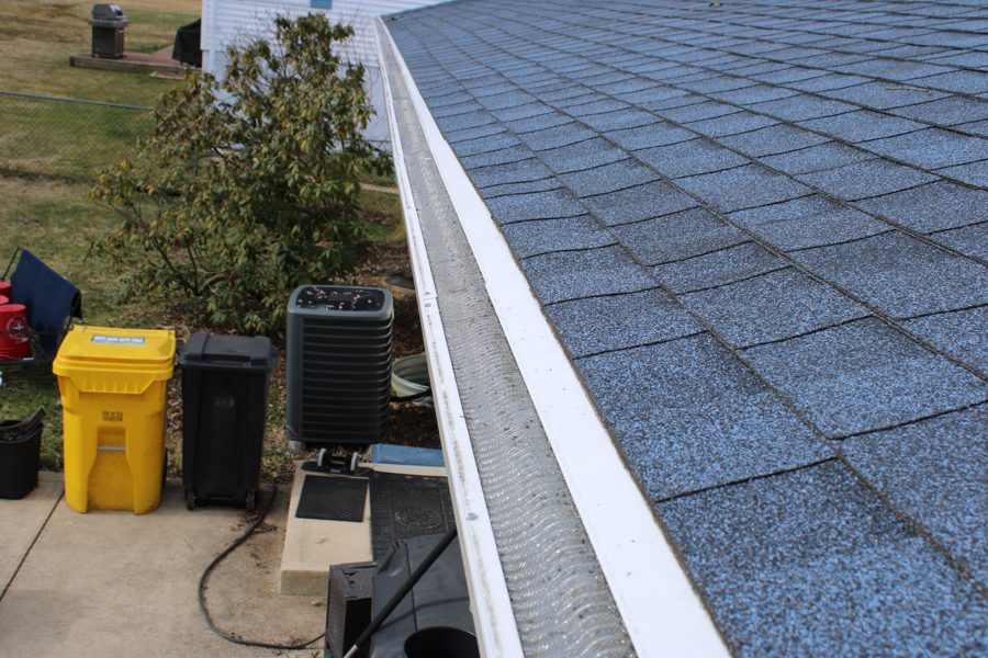 Valor gutter guard along a full run of gutter, seen from the roof