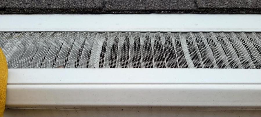 Close-up of the Valor micro mesh on a white gutter